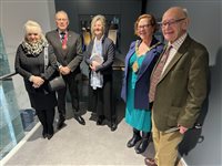 Ros Unwin, centre, with the Mayor of Stoke in front of the exhibit 
