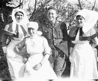 Nurses with an unidentified officer