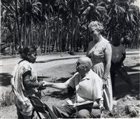 Gillies with a leprosy patient whilst painting