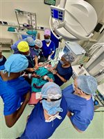 Local and BFIRST teams gather to operate on a child with a congential deformity