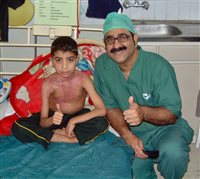 Haroon with a burns patient
