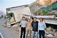 Cameron, Jill, Omar and Morag amid the devastation in the village of Balakot